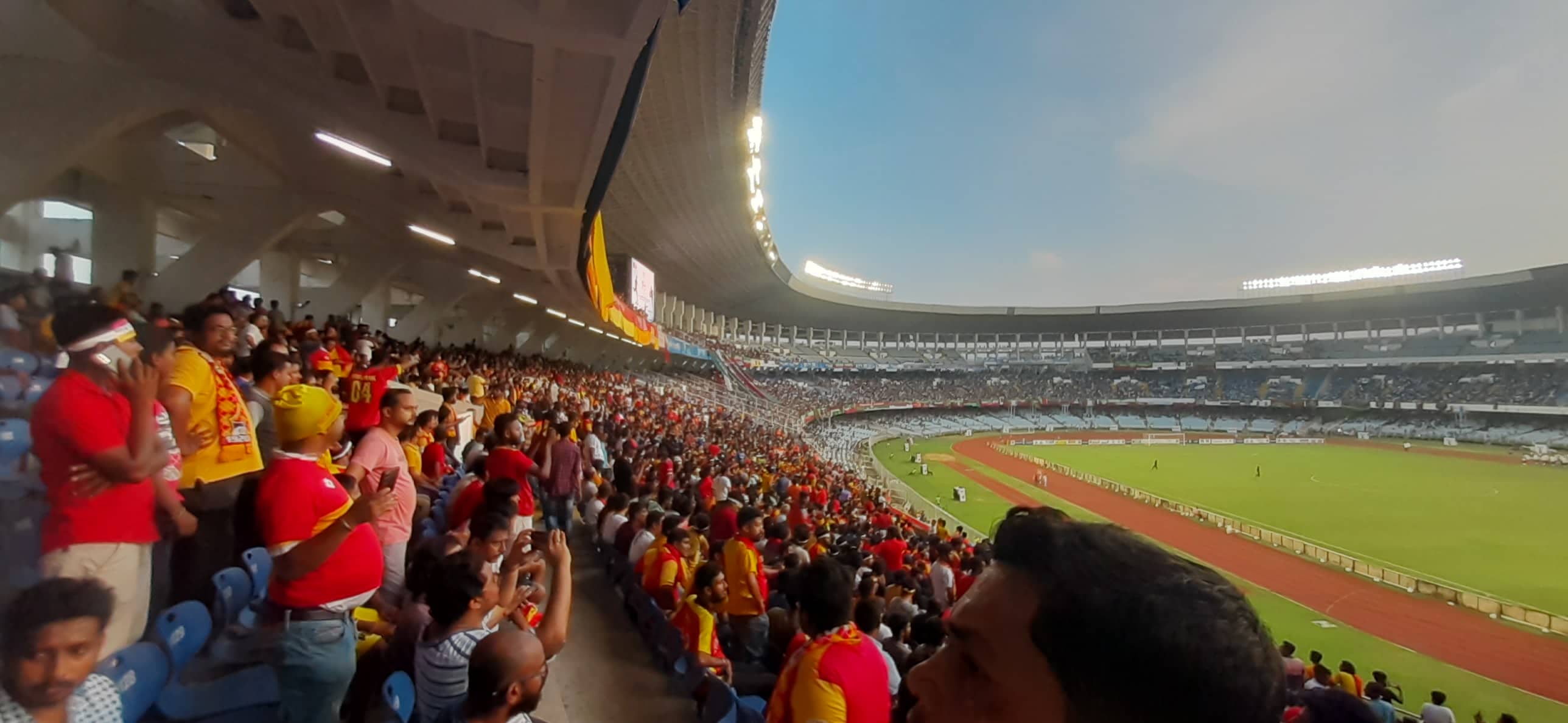 Indian football supporters watching from the stands at Salt Lake Stadium in Kolkata.