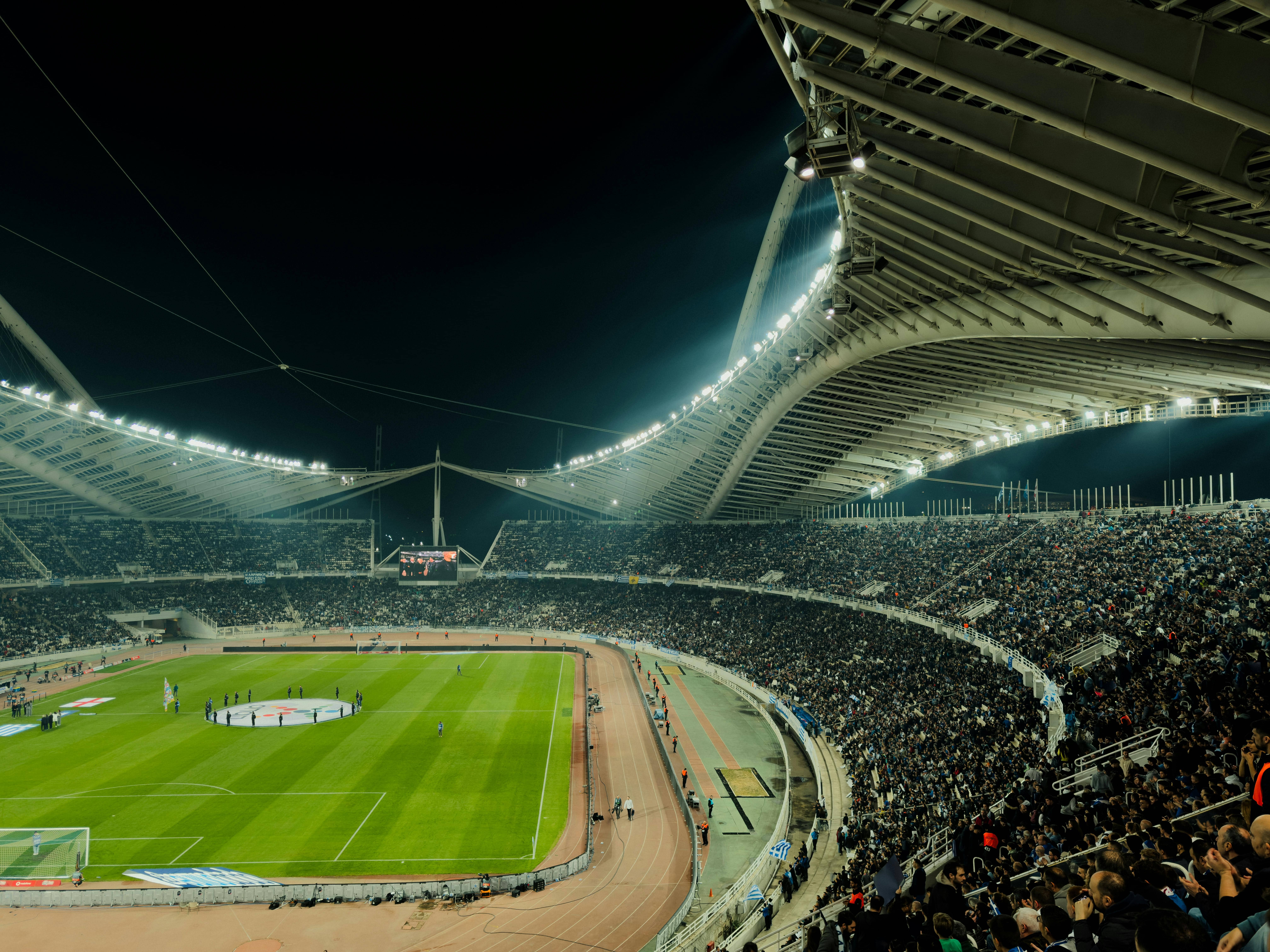 Packed football stadium crowd representing the full 2026 World Cup team field