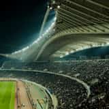 A crowded World Cup stadium at night before the quarterfinals.